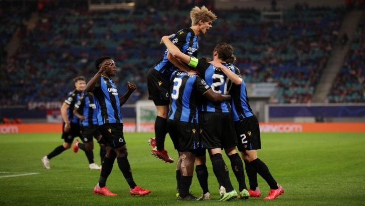 Club Brugge players celebrate a goal
